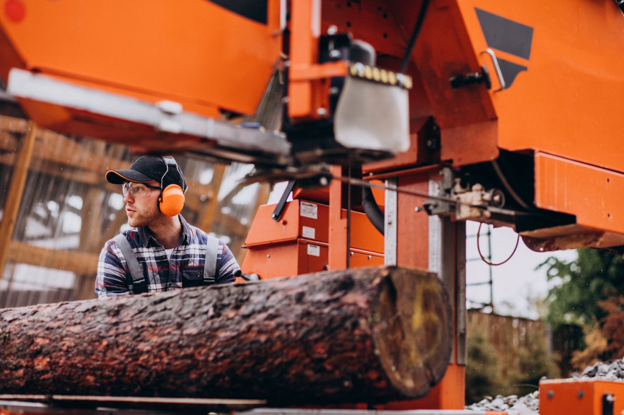 carpenter-working-sawmill-wood-manufacture-min