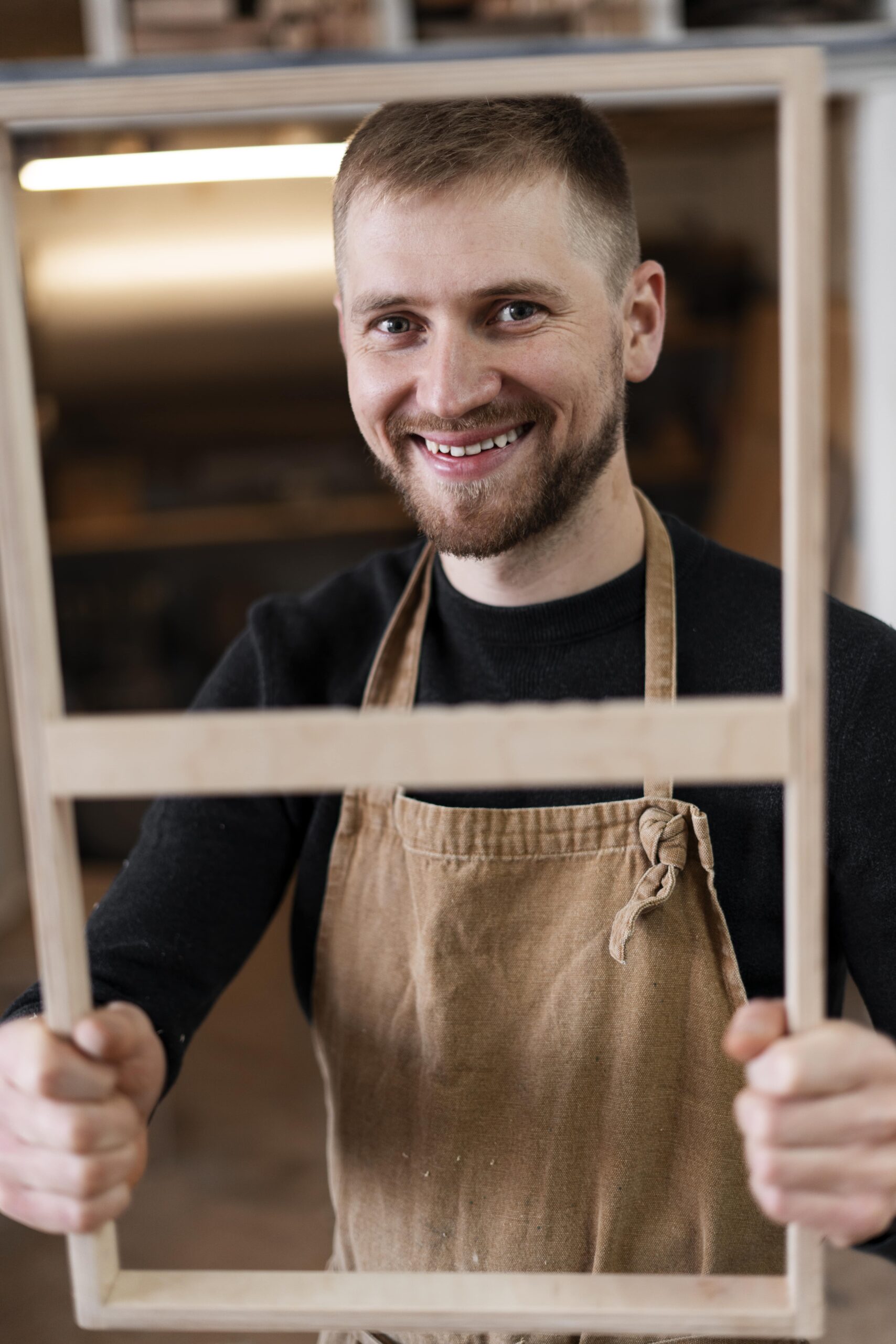 young-man-working-wood-engraving-workshop-min